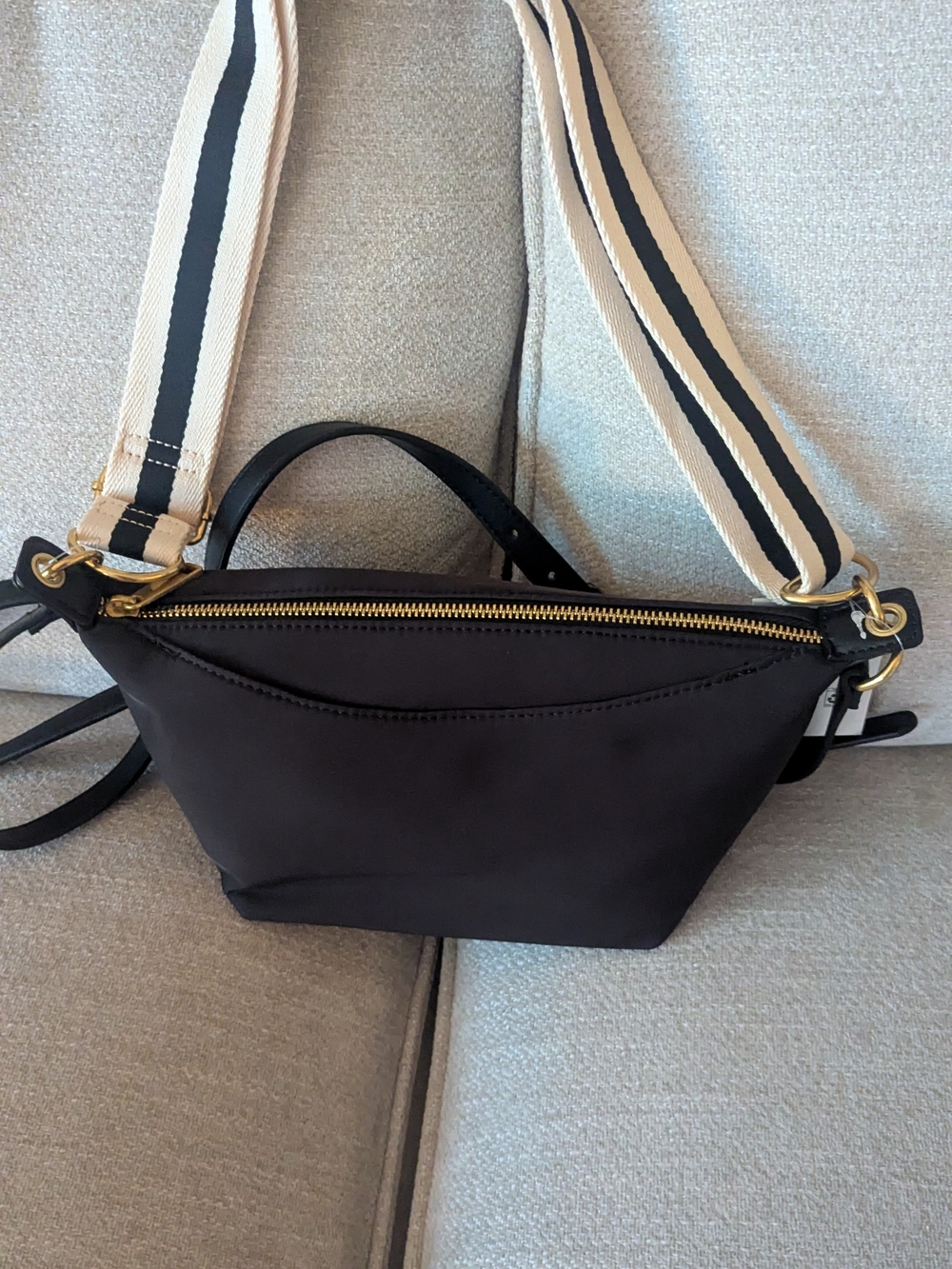 Black Crossbody Bag with Striped Canvas Strap and Gold Hardware